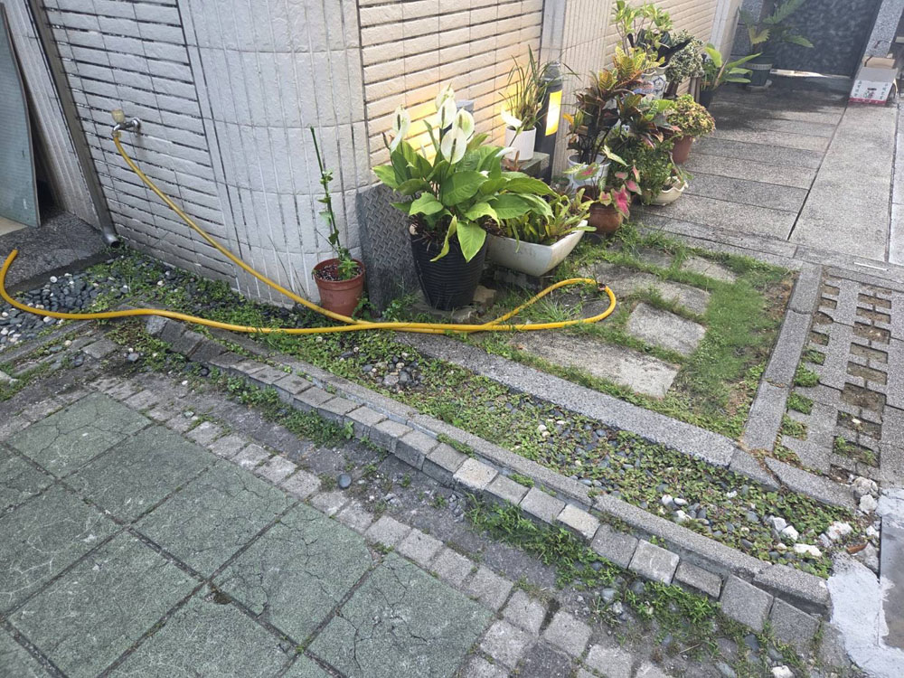 高雄中庭路磚鼓起整平
